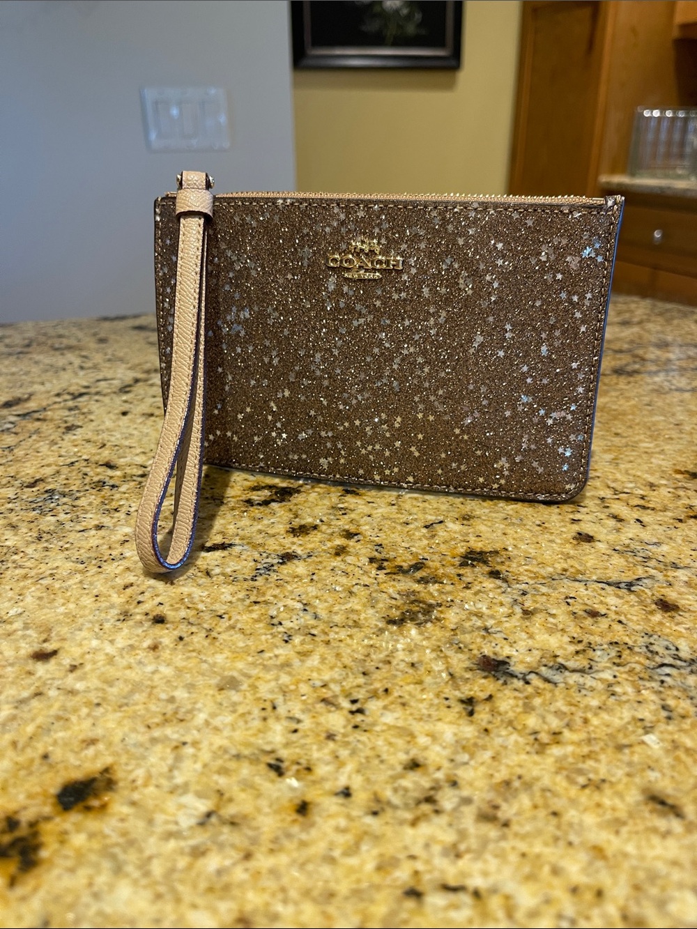 Coach Brown Glitter Star Wristlet with Gold Logo
